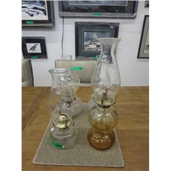 4 Vintage oil lamps w/ chimneys