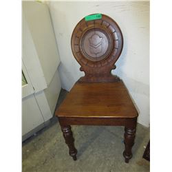 Vintage carved back wooden chair