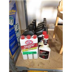 12 Containers of automotive lubricants