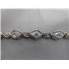 Image 1 : 6.50 CT Blue Topaz & Diamond bracelet