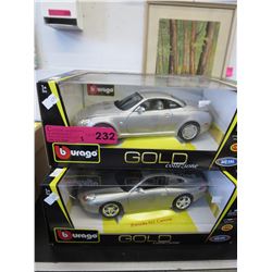 2 New die-cast model cars