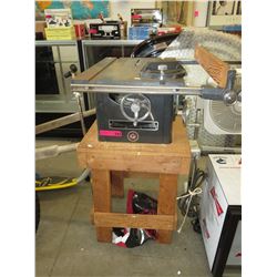 Rockwell table saw on a wood stand