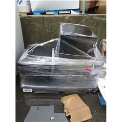 Wrapped skid of microwaves - store returns