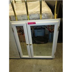 Bathroom medicine cabinet with mirrored doors