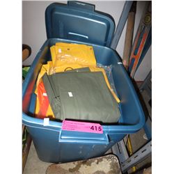 Tote of new PVC rain pants