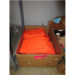 Box of new plasticized rain ponchos