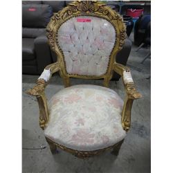 Carved wood arm chair with upholstered seat & back