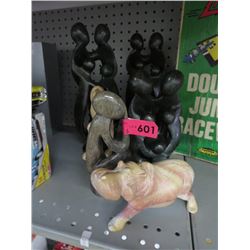 6 Carved stone statuettes