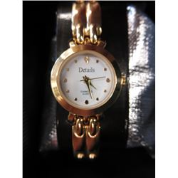 Ladies' link style Gold watch with Diamond