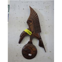 Mel Good wood carving "Raven stealing the Moon"