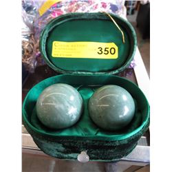Pair of 2.5" marble balls in case