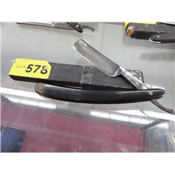 Vintage straight razor with original case