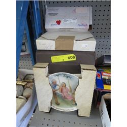 10 Collector plates in original boxes.