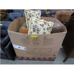 Bin of throw cushions.