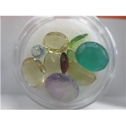 10 Gem jars filled with assorted cut gemstones