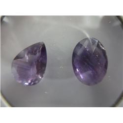 2 Large faceted Amethyst gemstones