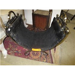 Log holder with leather carrier