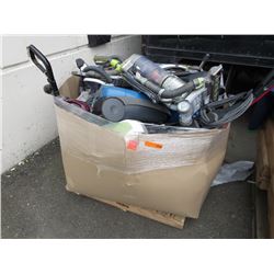 Skid of used vacuum cleaners