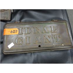 Cast metal "Steel Giant" stove door plate