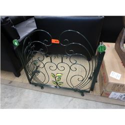 Metal folk art style fireplace screen
