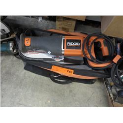 Rigid reciprocating saw in bag