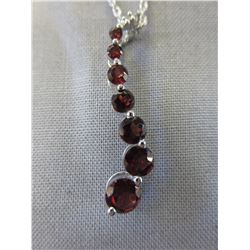 7 Stone Garnet Journey necklace