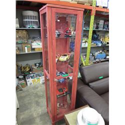 Glass display cabinet with car models
