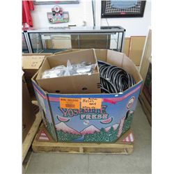 Bin of hoses & cordless telephones