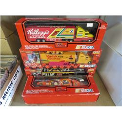 4 NASCAR 1:64 Scale die-cast cab transporters