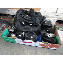 Used cameras & 16 vintage camera manuals