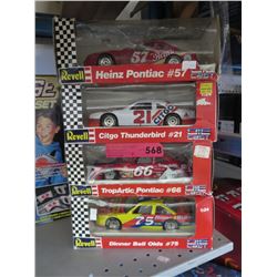 4 Die-cast Revell race cars