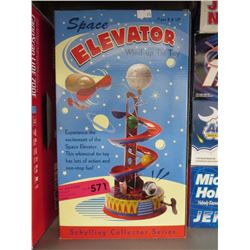 Schylling elevator wind up tin toy