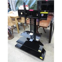 Entertainment unit with upright TV mount