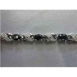 Oval cut Blue Sapphire tennis bracelet