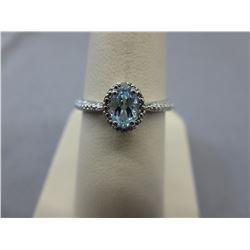 Oval cut Blue Topaz  solitaire ring