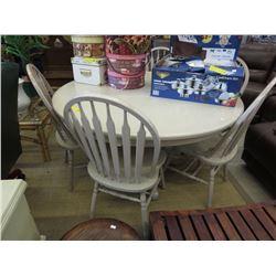 Round wood table with 6 matching chairs