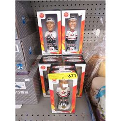 11 Hand painted bobble head dolls