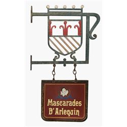 Wrought iron hanging store sign for Mascaraded D Arlequin.