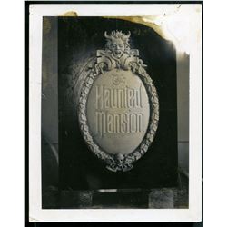Chris Mueller signed Haunted Mansion gate plaque reference photo