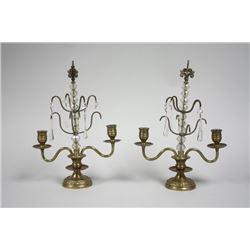 Pair of brass & crystal two arm candelabra