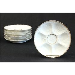 Set of 7 oyster plates
