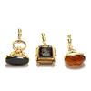 Image 1 : 3 unusual 14kt gold & stone watch fobs