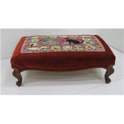 Oversized ottoman with carved legs