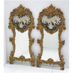 Pair of faux marble mirrors