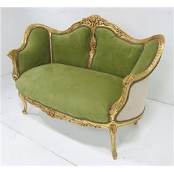 Heavily carved Louis XV style sofa