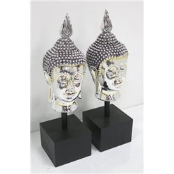 Pair silvered composition modern "Buddha Heads"