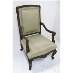 Heavily carved throne chair