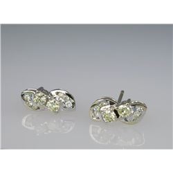 Glittering Fancy Yellow & White Diamond Earrings.