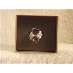 SILVERTONE RING WITH CZ AND AMETHYST COLORED STONES