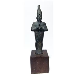 An Egyptian bronze standing figure of Osiris